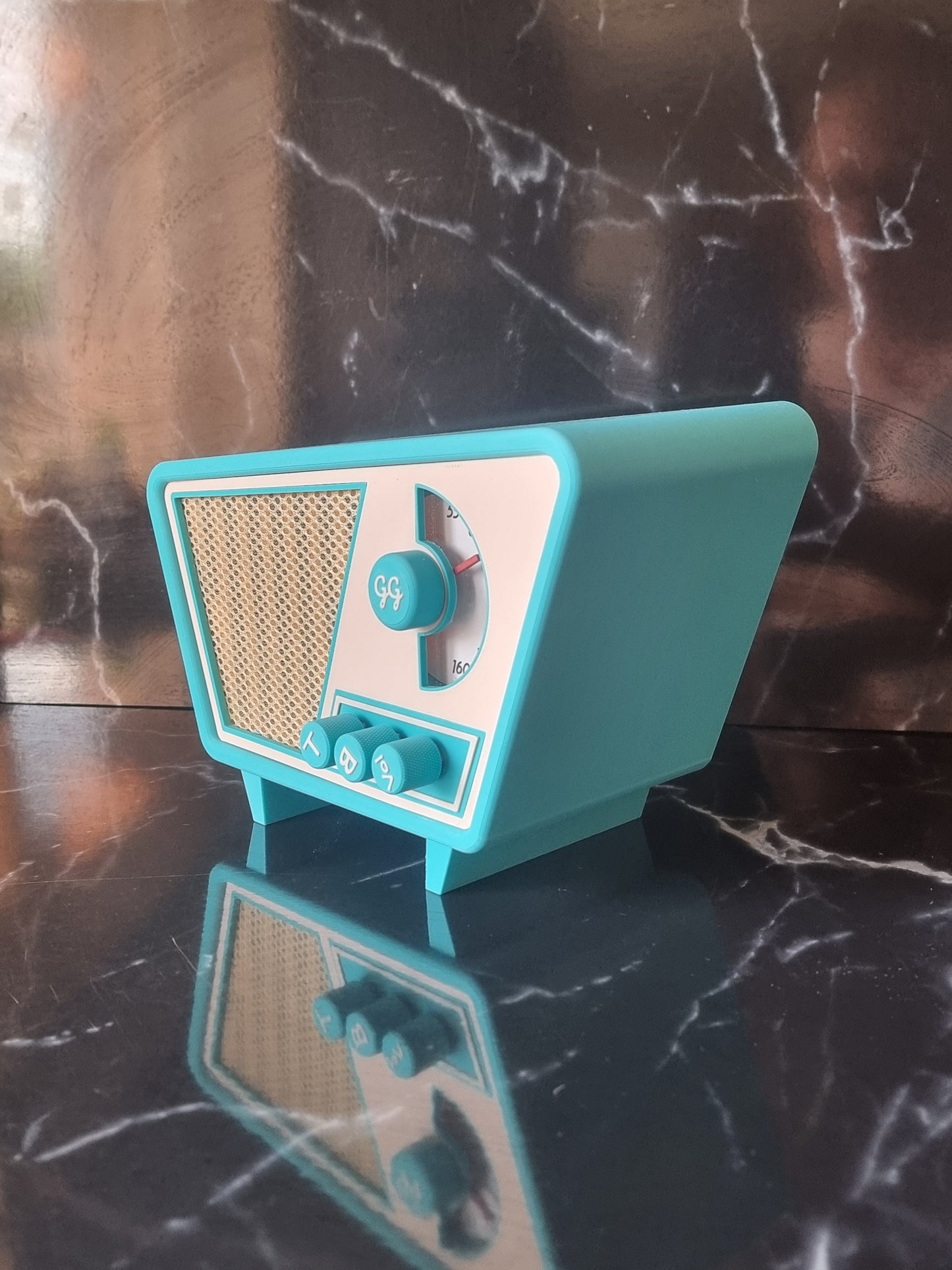 Retro Bluetooth device. Vintage style speaker. 1950s. Turquoise.