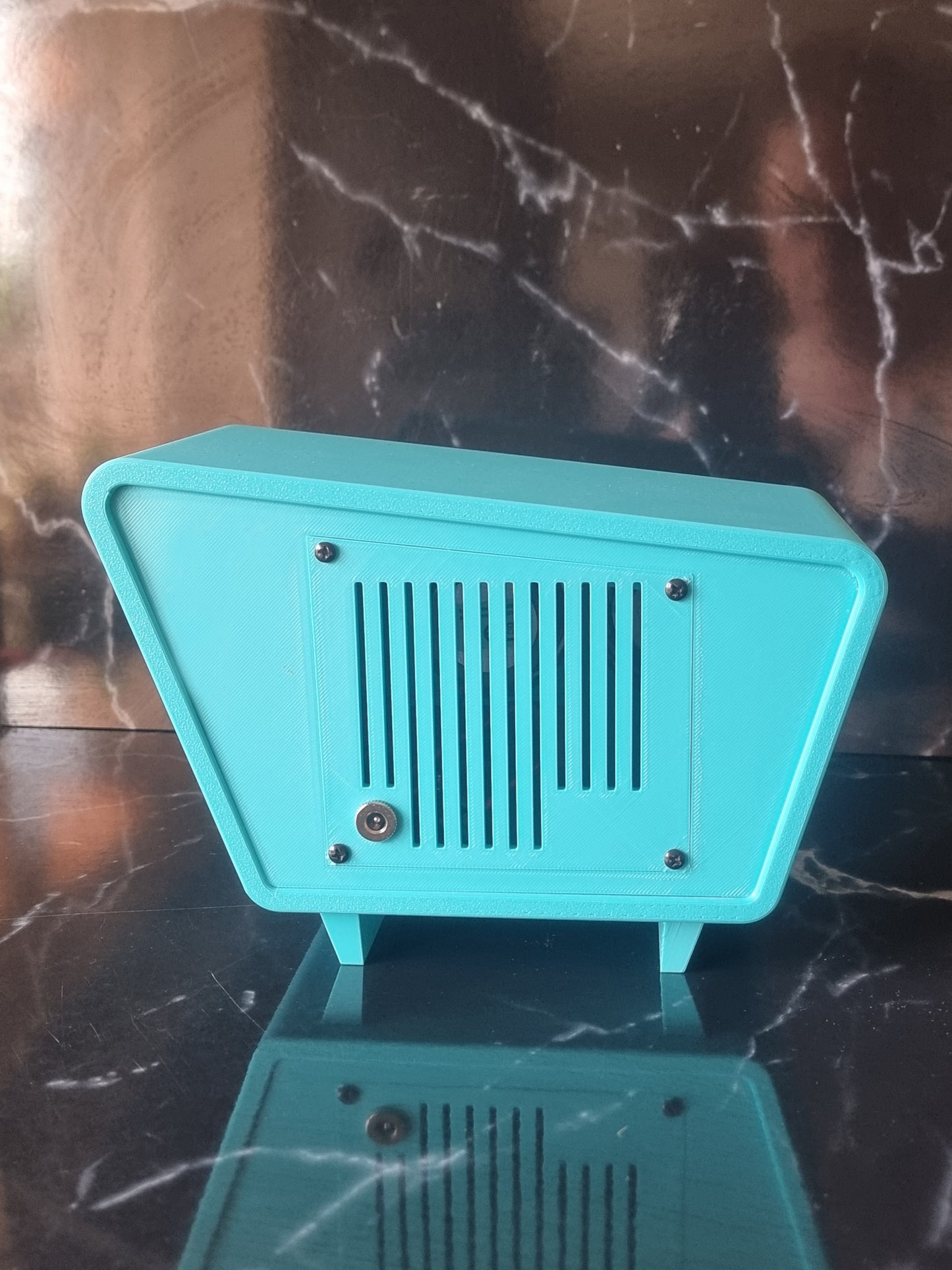 Retro Bluetooth device. Vintage style speaker. 1950s. Turquoise.