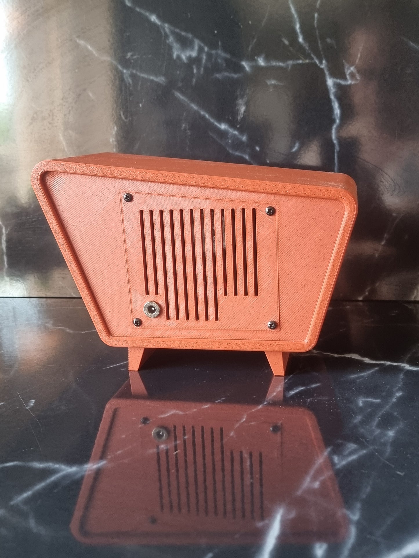 The Jetson, Retro Bluetooth device. Vintage style speaker. 1950s. Terracotta